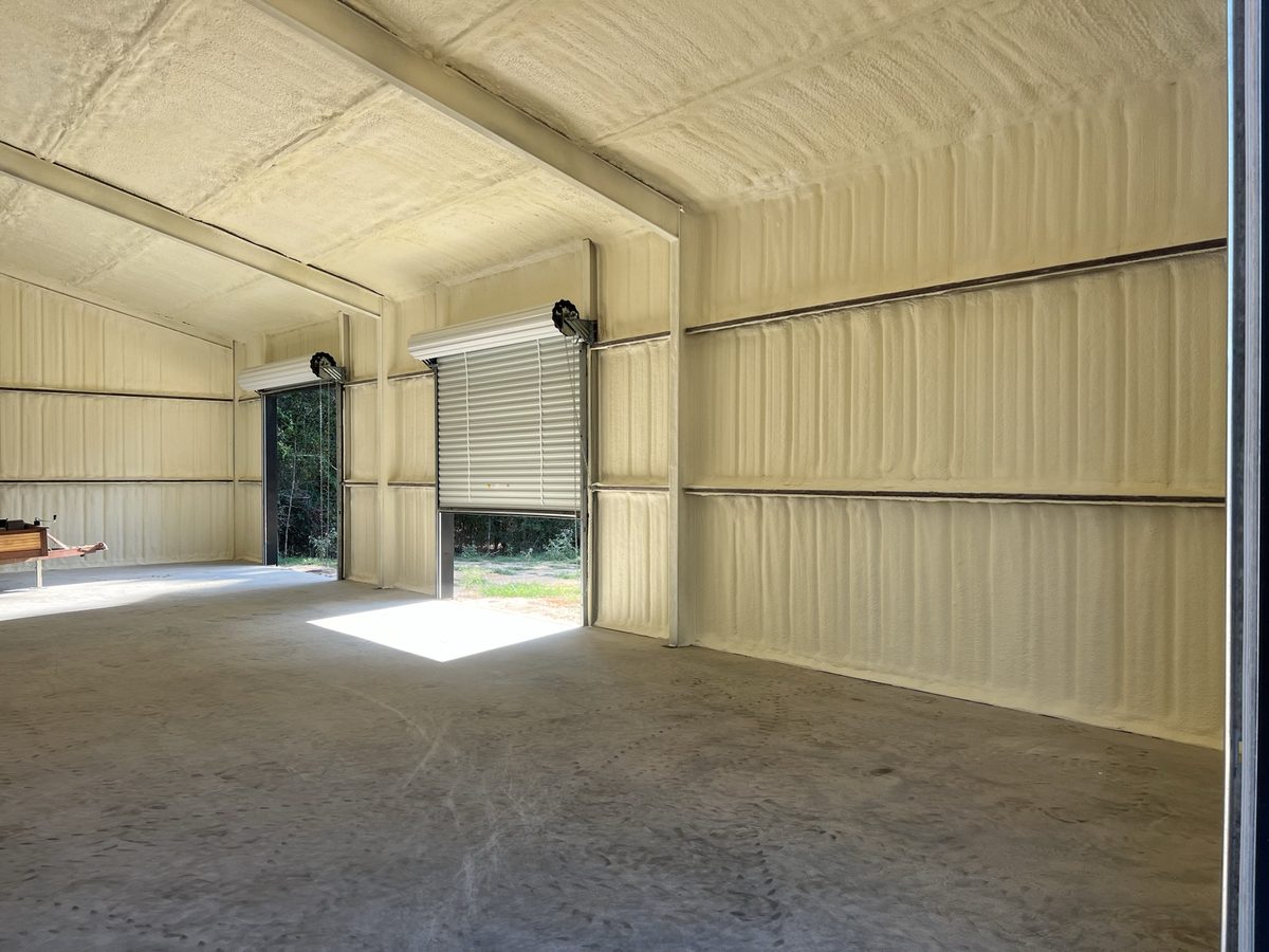 Metal shop insulated with a mix of open- and closed-cell spray foam